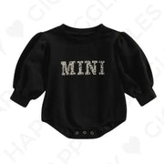 Schwarzer Pullover-Strampler mit Print - Happy Giggles